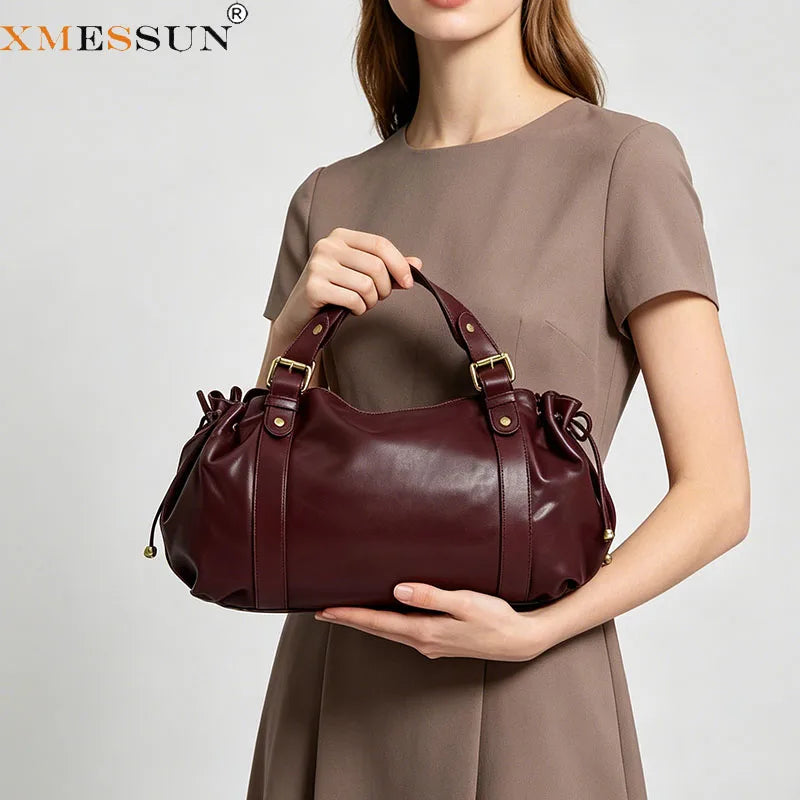 Sac à main Boston grande capacité pour femme, en cuir souple, élégant et polyvalent. Idéal pour le travail, les déplacements quotidiens et les sorties, il peut être porté à l'épaule ou en bandoulière.
