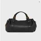Sac à main Boston grande capacité pour femme, en cuir souple, élégant et polyvalent. Idéal pour le travail, les déplacements quotidiens et les sorties, il peut être porté à l'épaule ou en bandoulière.
