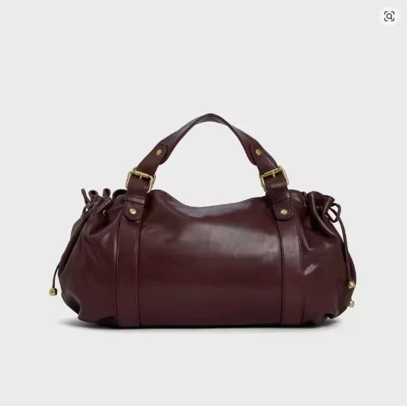 Sac à main Boston grande capacité pour femme, en cuir souple, élégant et polyvalent. Idéal pour le travail, les déplacements quotidiens et les sorties, il peut être porté à l'épaule ou en bandoulière.