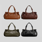 Sac à main Boston grande capacité pour femme, en cuir souple, élégant et polyvalent. Idéal pour le travail, les déplacements quotidiens et les sorties, il peut être porté à l'épaule ou en bandoulière.